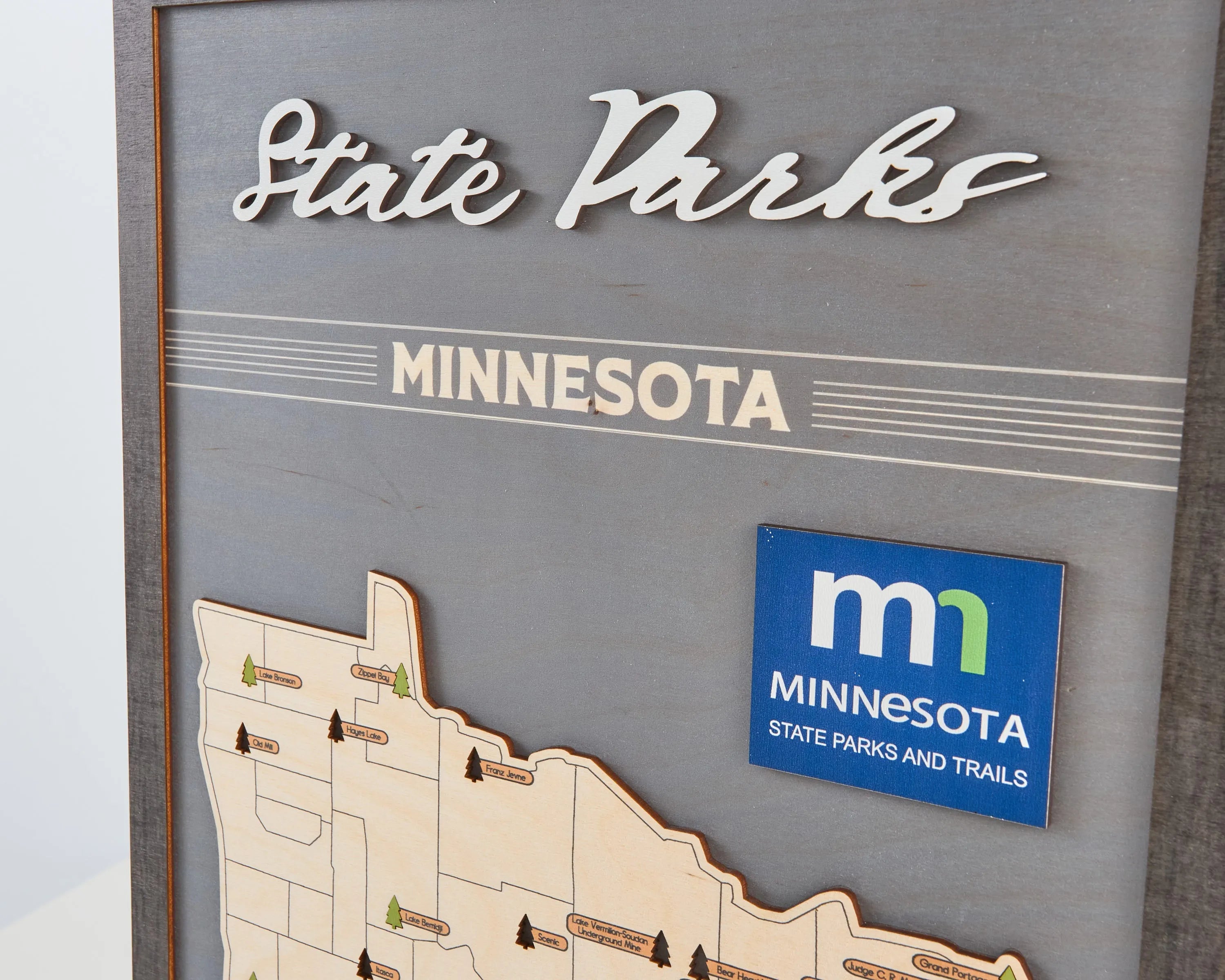 US Wooden Minnesota State Parks Map With Trees To Record Park Visits (Light Grey)